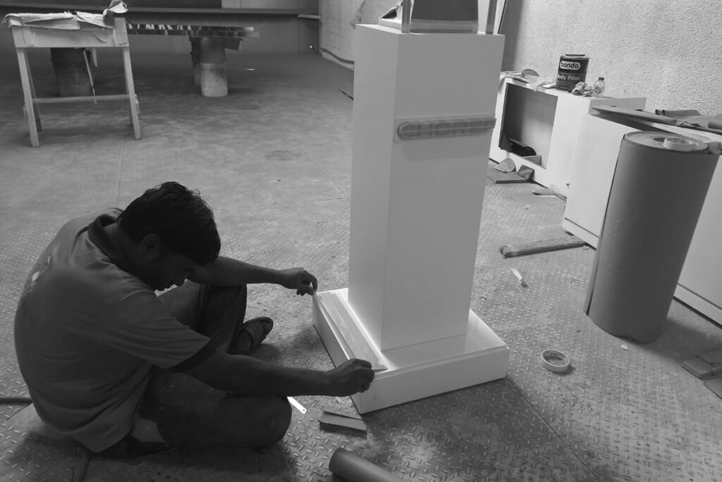A carpenter working on a custom furniture project