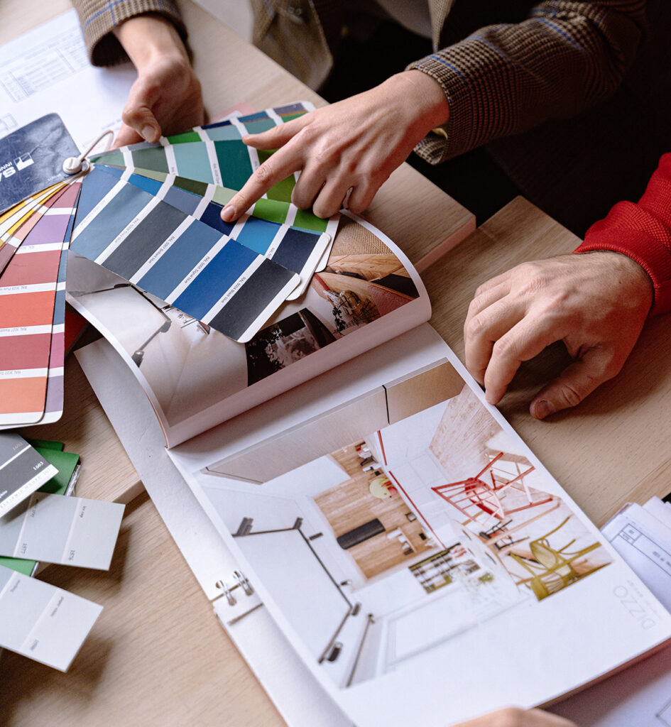  Men Discussing Colours for an Interior Design Project