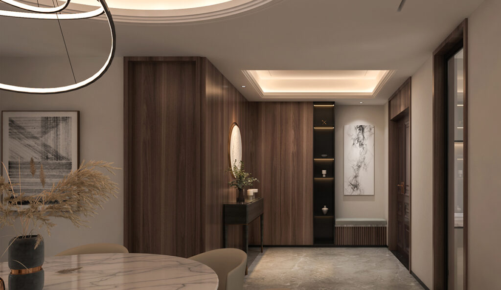 A stunning entrance and foyer with elegant doors, lighting and artwork