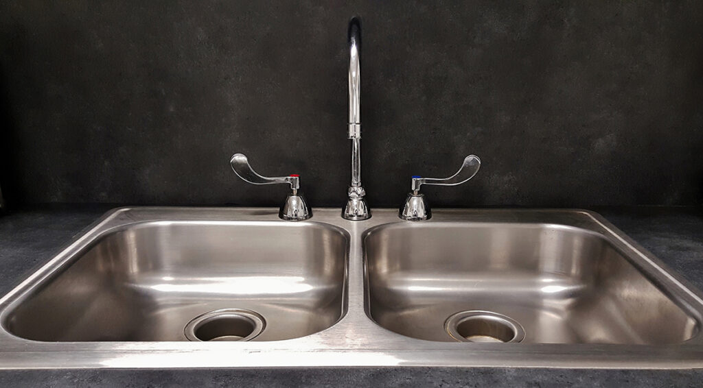 Close-up image of a stainless steel commercial sink