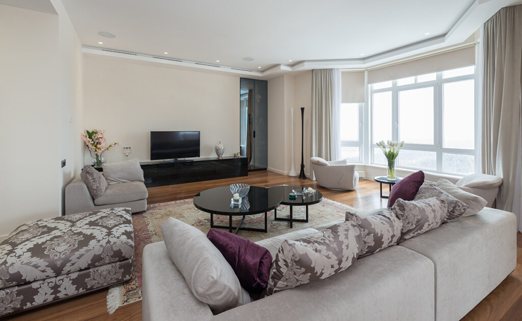 living room with natural light and greenery