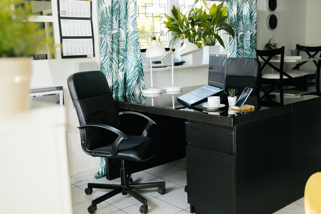 workspace with ergonomic furniture and plants