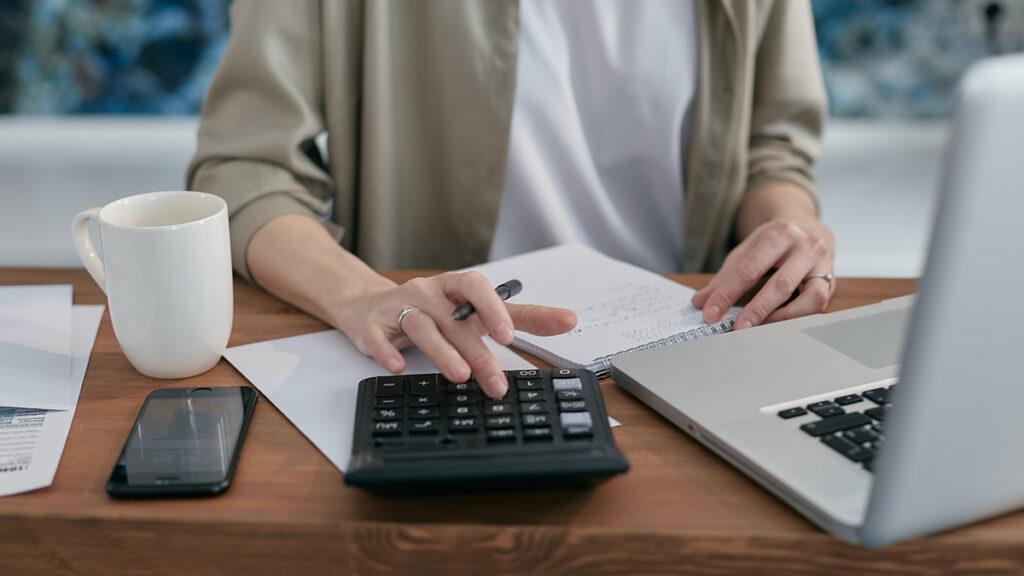 a person using a calculator