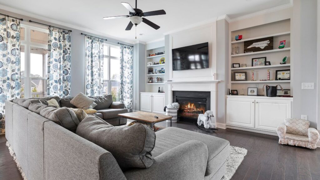 a beautifully designed living room with a focus on textile and fabric elements