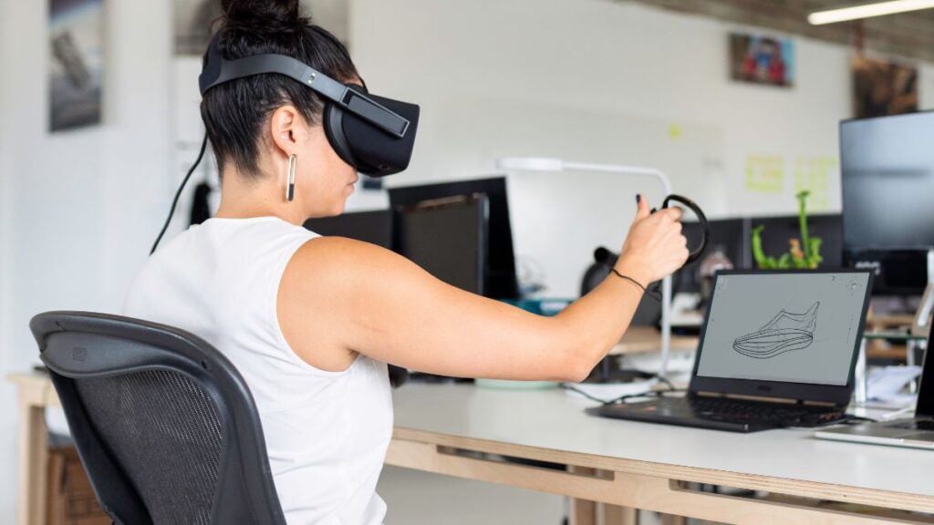 an image showing a designer using a vr headset to interact with a 3d model